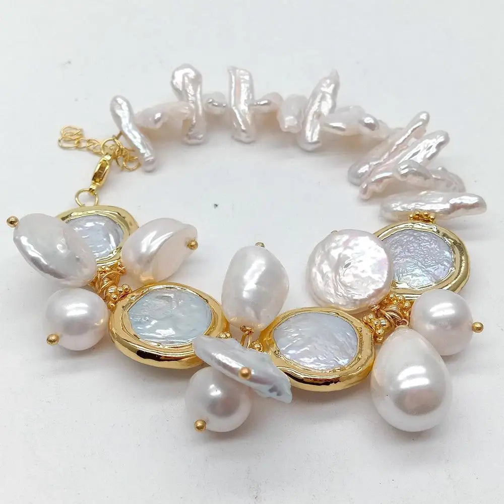 Pearl bracelet with gold accents on a white background