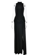 Black evening gown on a mannequin against a white background