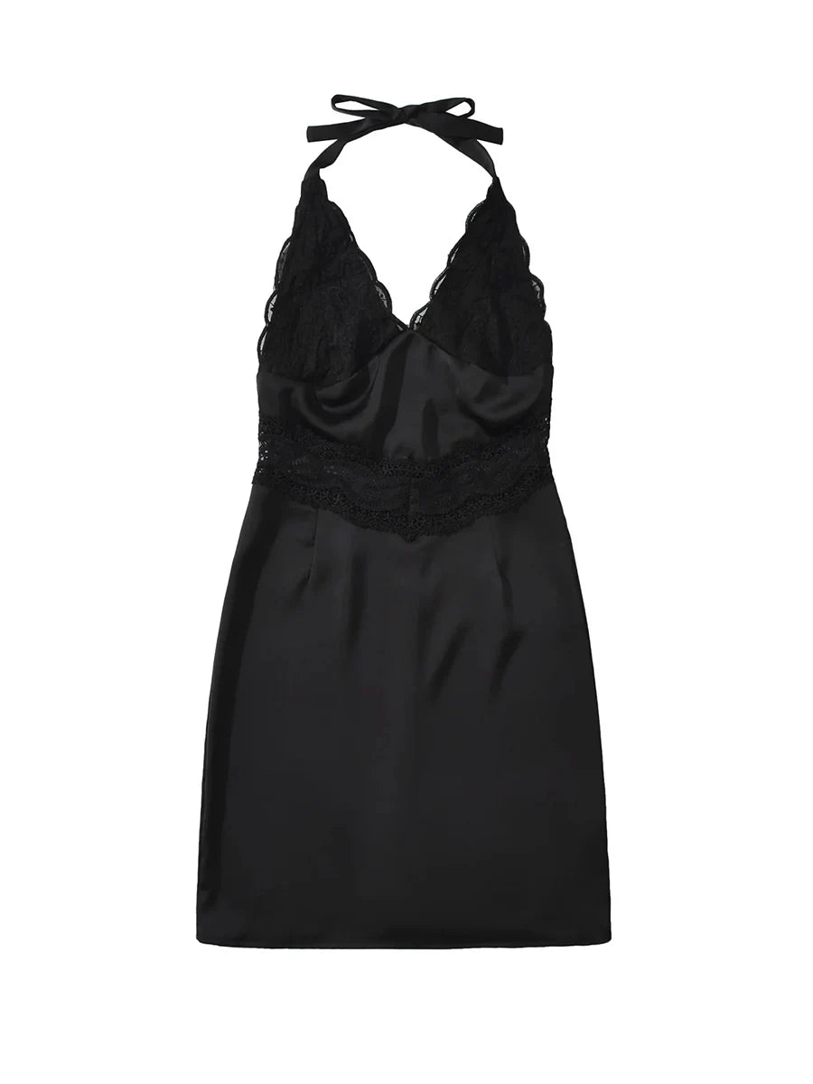 Black halter neck dress with lace details on a white background
