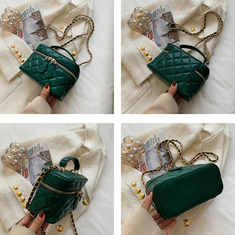 Green quilted handbag held by a person on a white surface with newspapers and pearls.