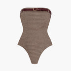 Brown houndstooth patterned strapless bodysuit with a belt on a white background