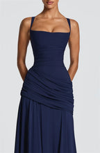 Navy blue dress on a white background