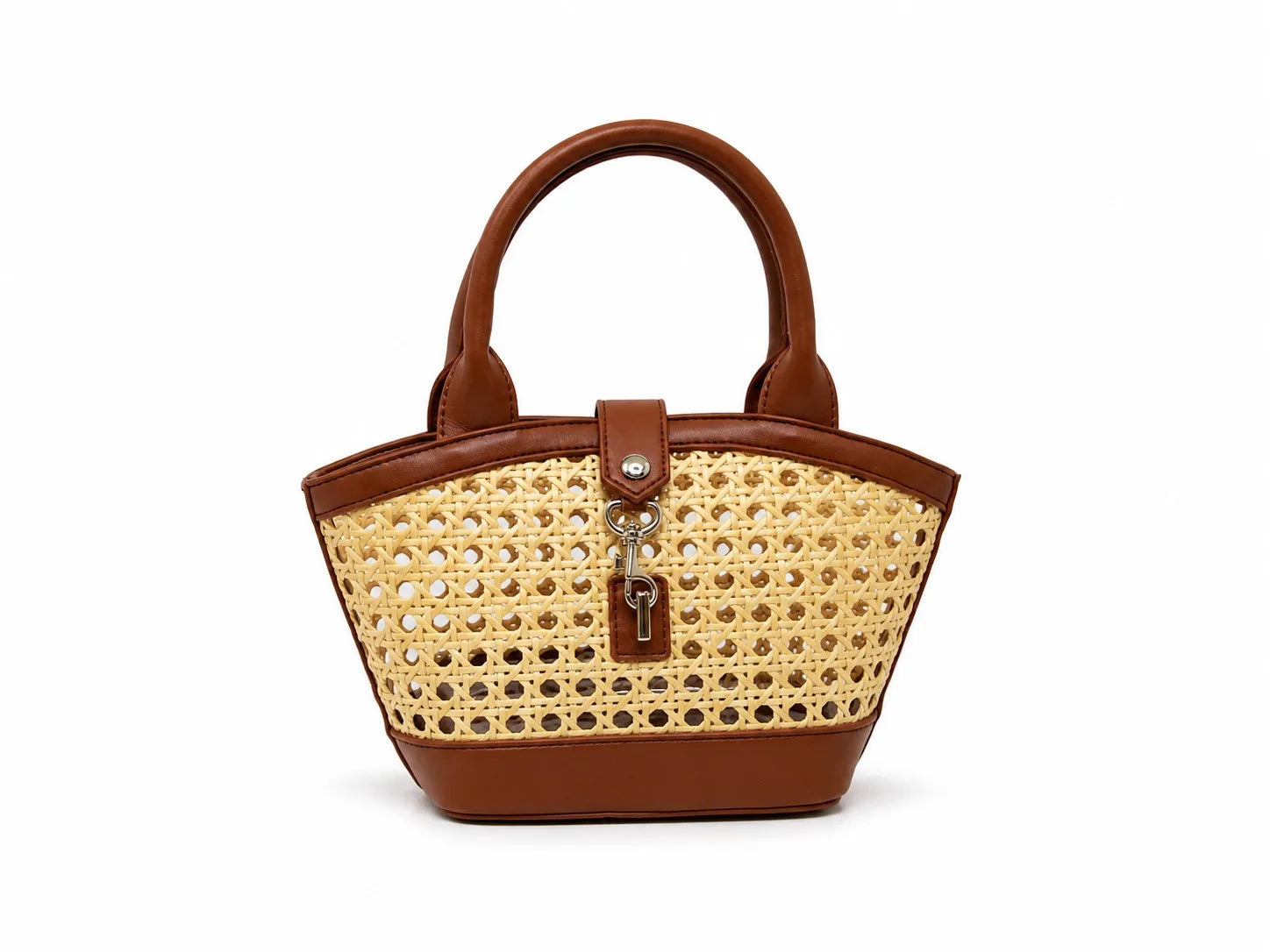 Woven handbag with brown leather accents on a white background