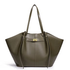 Green handbag with a gold clasp on a white background