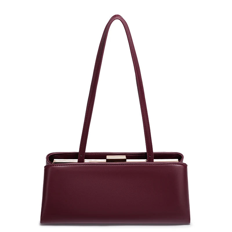 Maroon handbag with a gold clasp on a white background