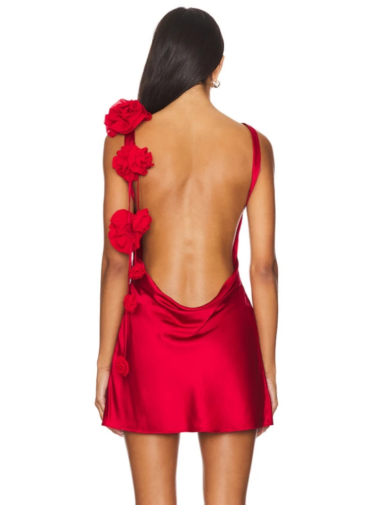 Red dress with floral details on a white background