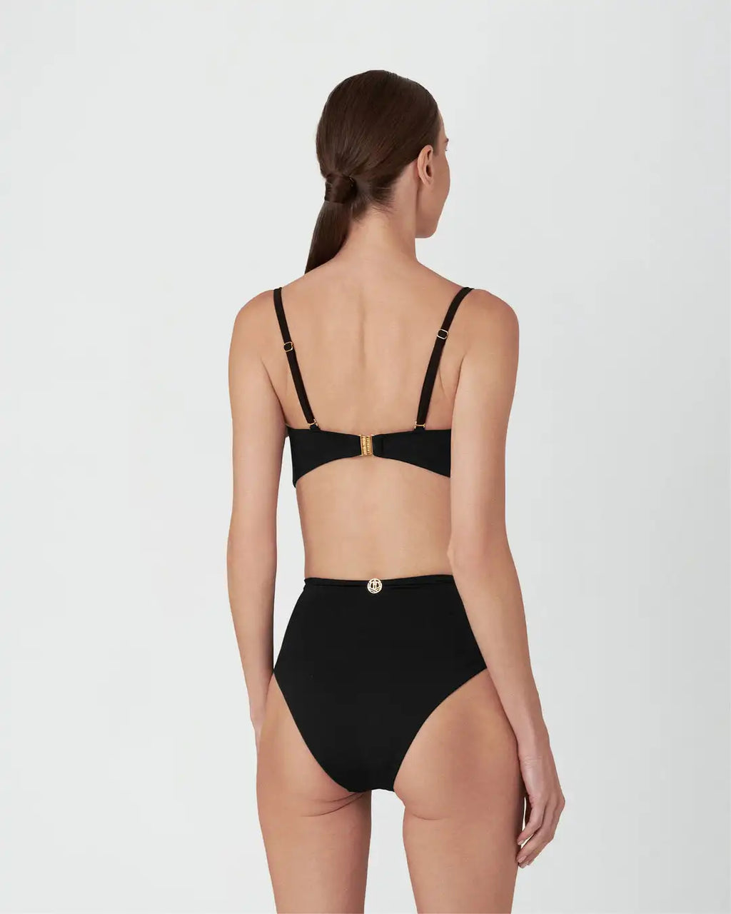 Black bikini set on a white background