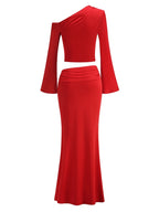 Red two-piece outfit with long sleeves on a white background