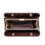 Brown leather briefcase with gold accents on a white background