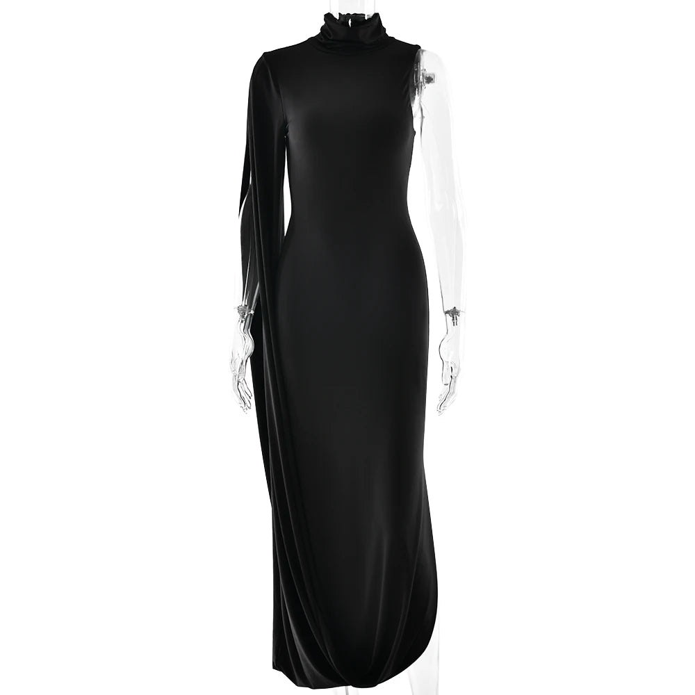 Black evening gown with sheer sleeves on a white background