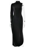 Black evening gown with sheer sleeves on a white background