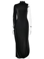 Black evening gown with sheer sleeves on a white background