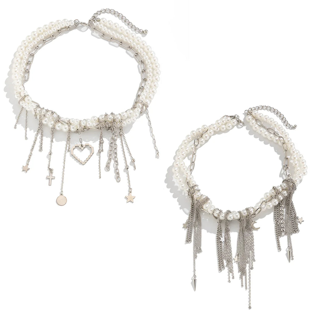 Two pearl necklaces with fringe details on a white background