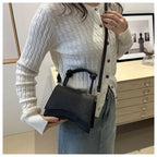 Knott Flap Crossbody Bag