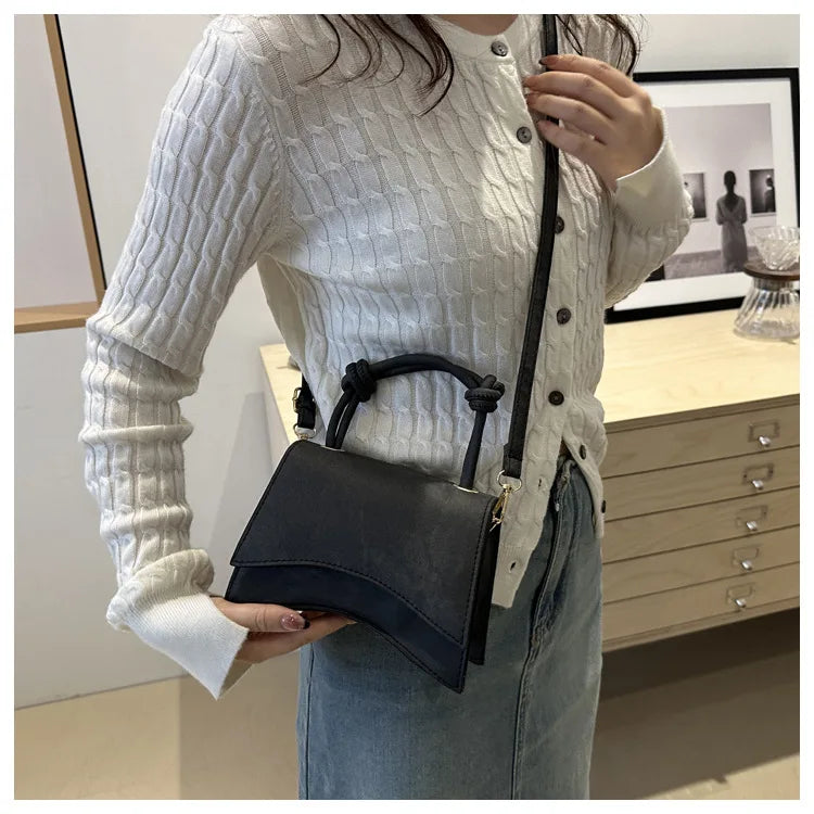 Knott Flap Crossbody Bag