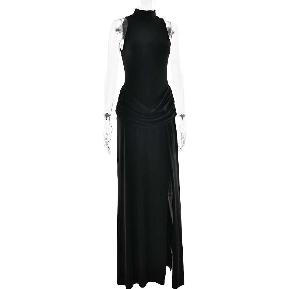 Black sleeveless dress with sheer shoulder panels on a white background