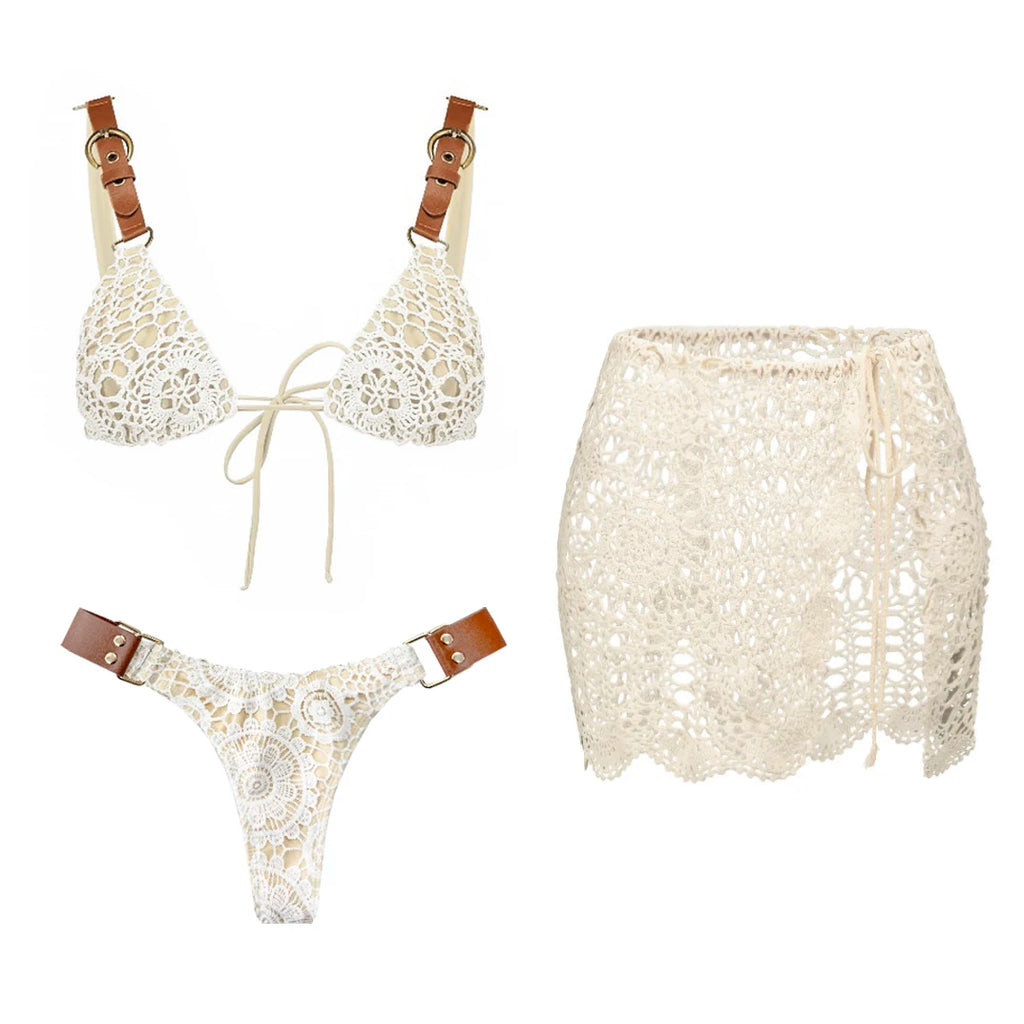 White lace bikini set with brown straps on a white background