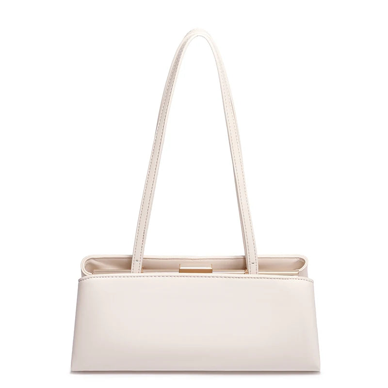White handbag with a strap on a white background