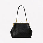 Black woven leather handbag with a gold kiss-lock frame and a single shoulder strap, shown on a plain white background.