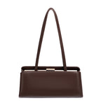 Brown handbag with a strap on a white background