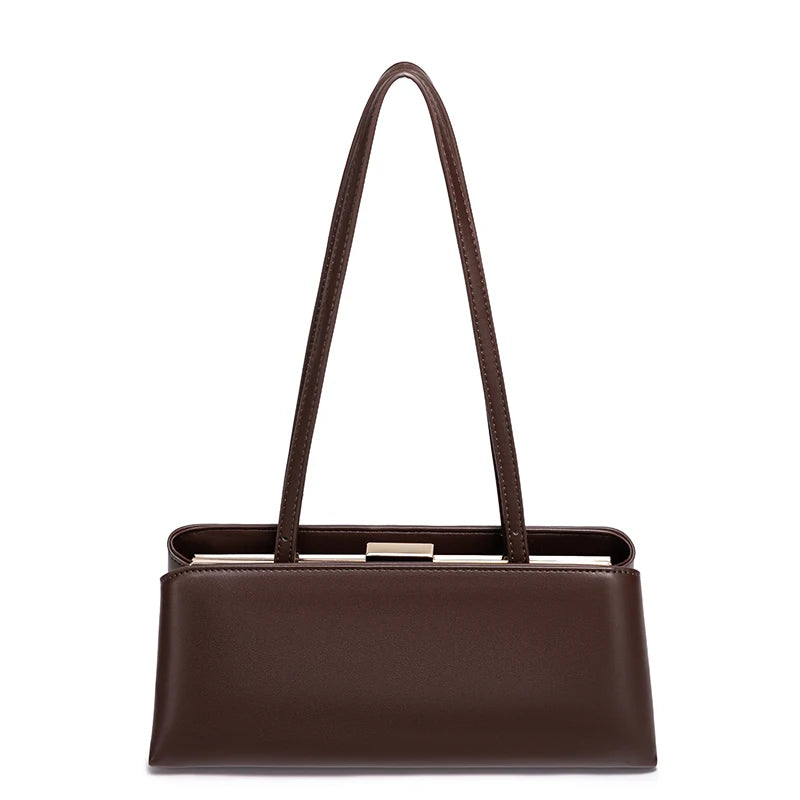 Brown handbag with a strap on a white background