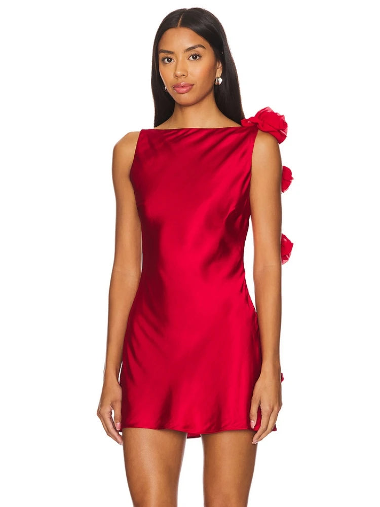 Red dress with floral details on a white background