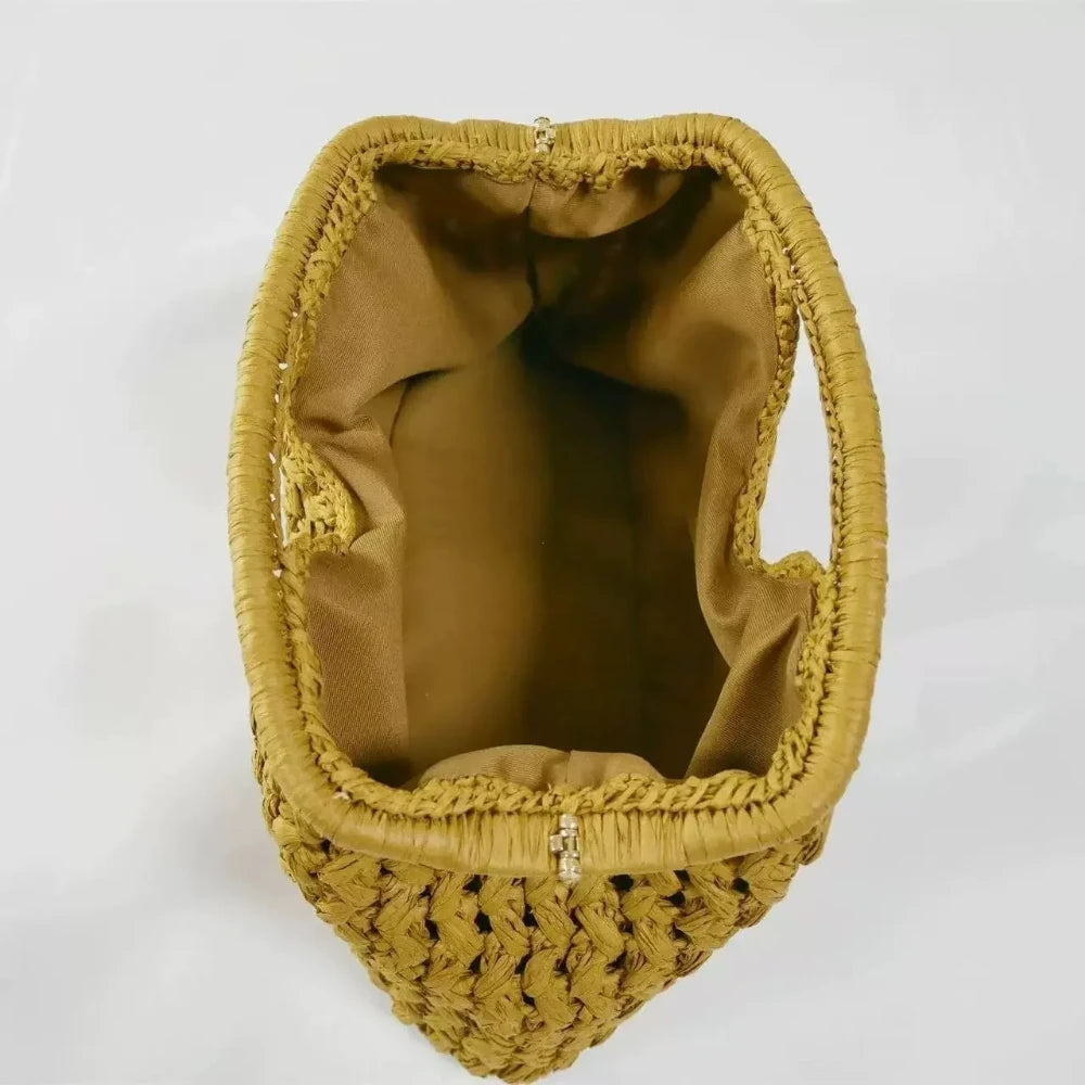 Yellow woven handbag on a white background