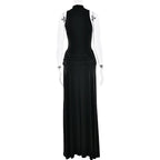 Black evening gown on a mannequin against a white background