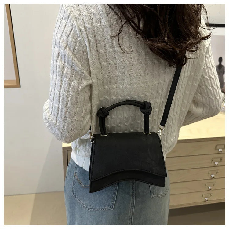 Knott Flap Crossbody Bag