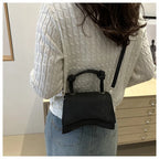 Knott Flap Crossbody Bag