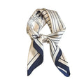 A silk scarf with a geometric pattern, featuring horizontal stripes in shades of navy and beige.